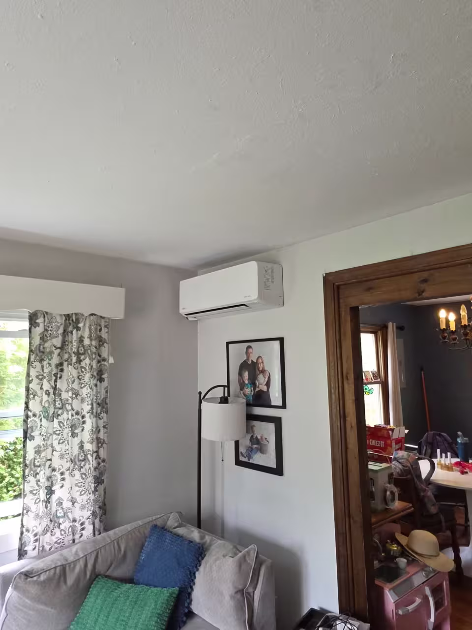 Wall-mounted ductless mini split installed in a living room
